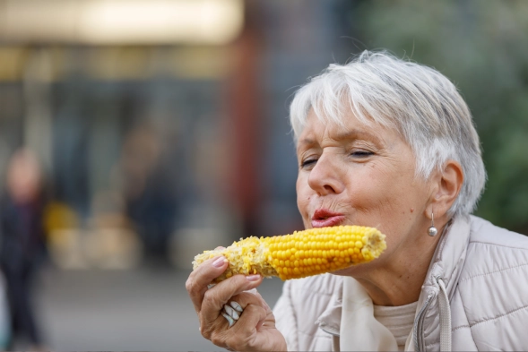 old women eating corns