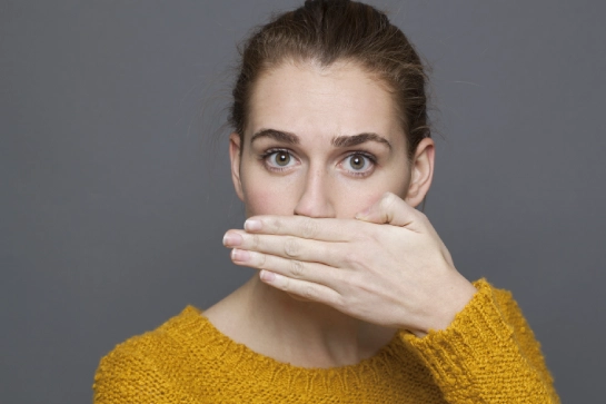 a women facing bad breath